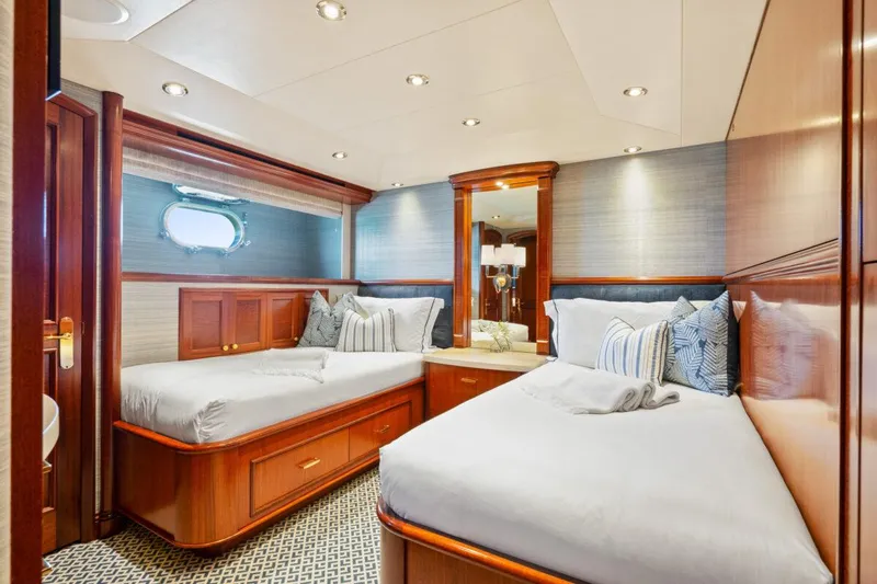 Risk And Reward Yacht Photos Pics Luxurious twin bedroom in 2004 Crescent Raised Pilothouse yacht with elegant wood finishes.