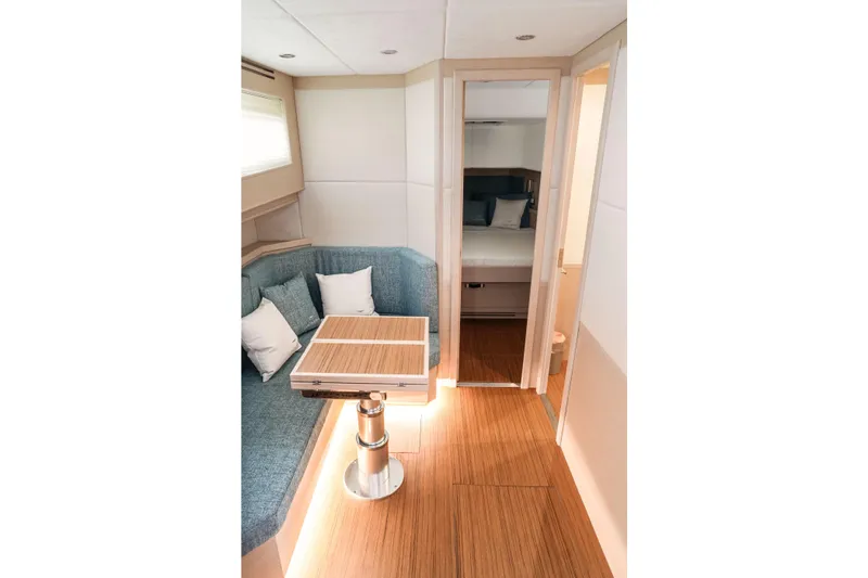 Viviendo Yacht Photos Pics 2024 Lancia Aprea 52 yacht interior with cozy seating and modern design.