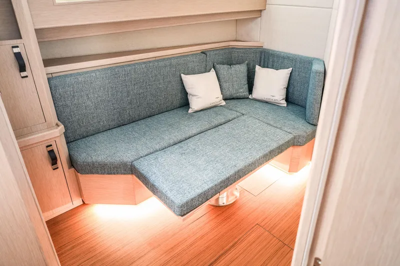Viviendo Yacht Photos Pics 2024 Lancia Aprea 52 interior with modern seating and ambient lighting.