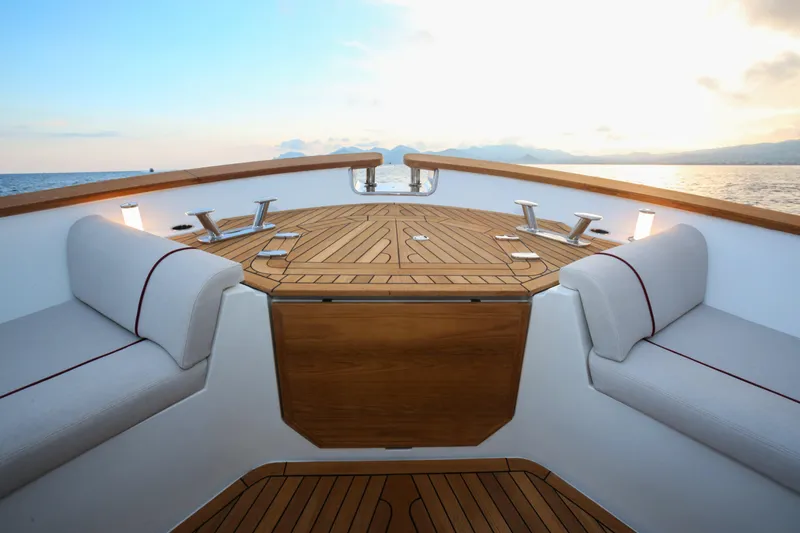 Viviendo Yacht Photos Pics 2024 Lancia Aprea 52 yacht deck with elegant seating and ocean view.