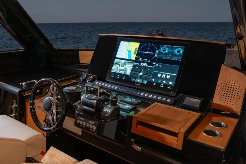Viviendo Yacht Photos Pics 2024 Lancia Aprea 52 yacht dashboard with advanced navigation system at sea.