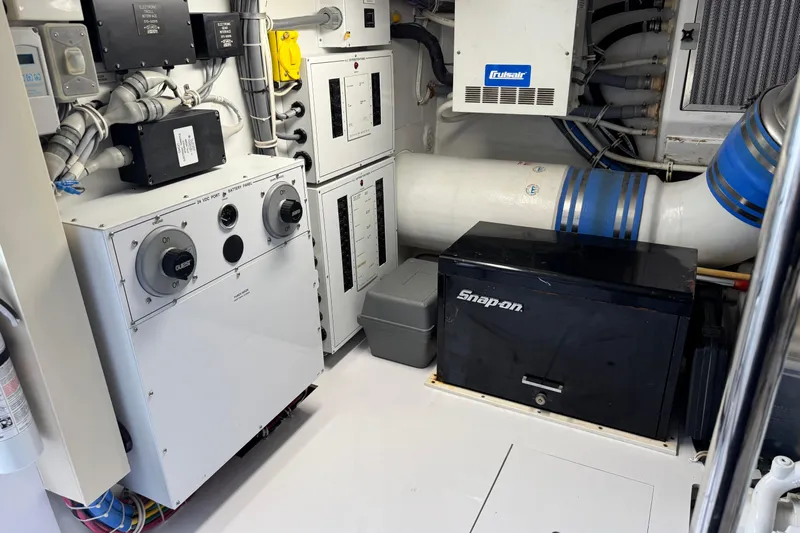 Glomar I Yacht Photos Pics Engine room of 2004 Hatteras 60 Convertible with electrical panels and Snap-on toolbox.