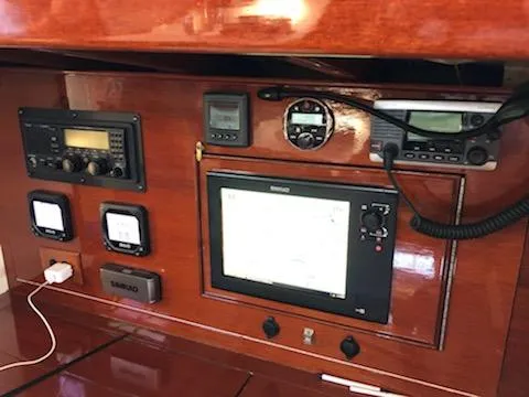 Light Reign Yacht Photos Pics Navigation equipment on a 2000 Cherubini Schooner, featuring various control panels and displays.