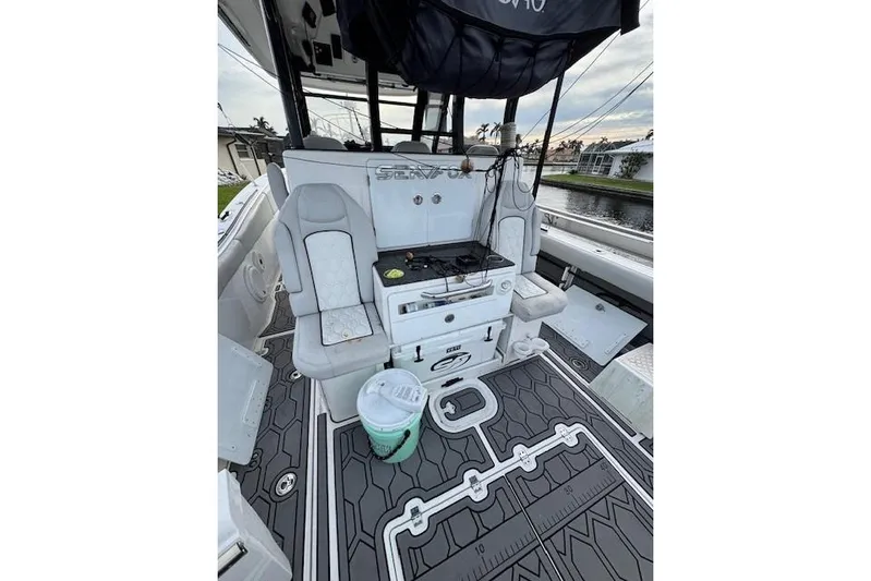  Yacht Photos Pics 2021 Sea Fox 368 Commander boat interior with seating and fishing equipment.