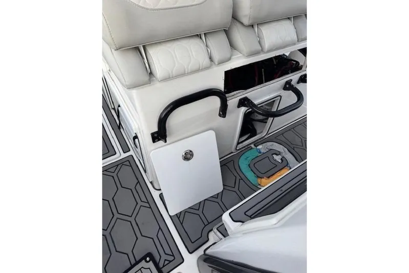  Yacht Photos Pics 2021 Sea Fox 368 Commander interior with cushioned seating and storage compartments.