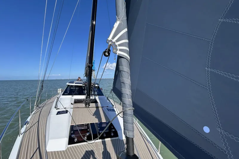  Yacht Photos Pics Modern Amel 50 sailboat on open water, showcasing sleek design and sails, 2025 model.