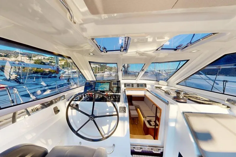  Yacht Photos Pics Modern Amel 50 yacht cockpit interior, 2025 model, featuring sleek design and advanced navigation systems.