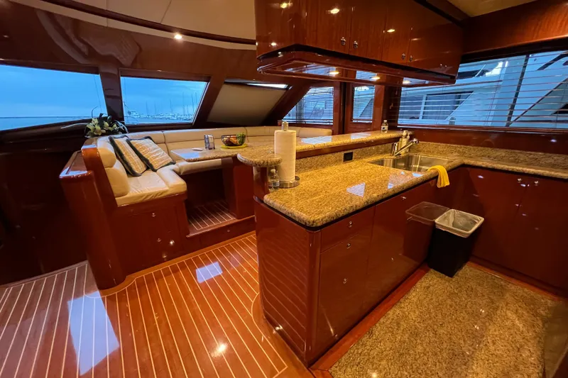 Bucephulas Yacht Photos Pics Luxurious 2012 Hampton motor yacht interior with elegant kitchen and seating area.