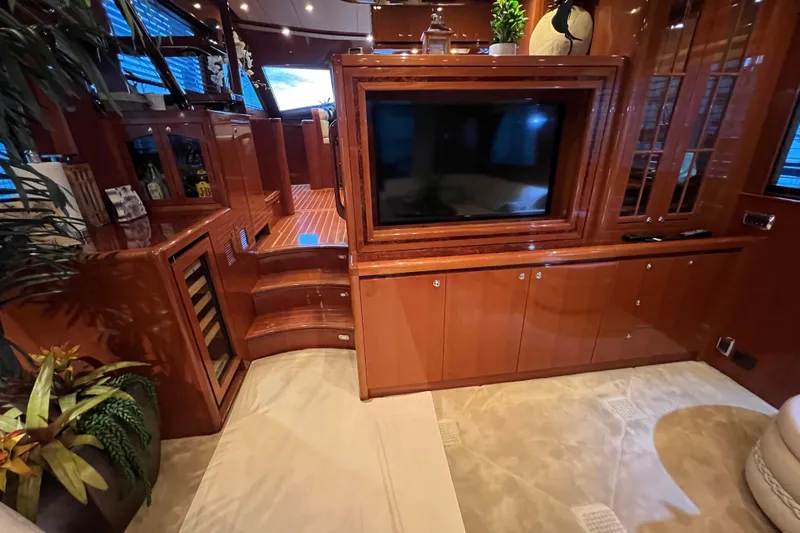 Bucephulas Yacht Photos Pics Luxurious 2012 Hampton motor yacht interior with elegant wood finishes and modern entertainment system.