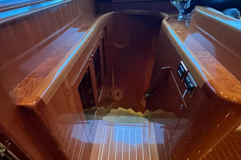 Bucephulas Yacht Photos Pics Luxurious wooden staircase on a 2012 Hampton motor yacht interior.