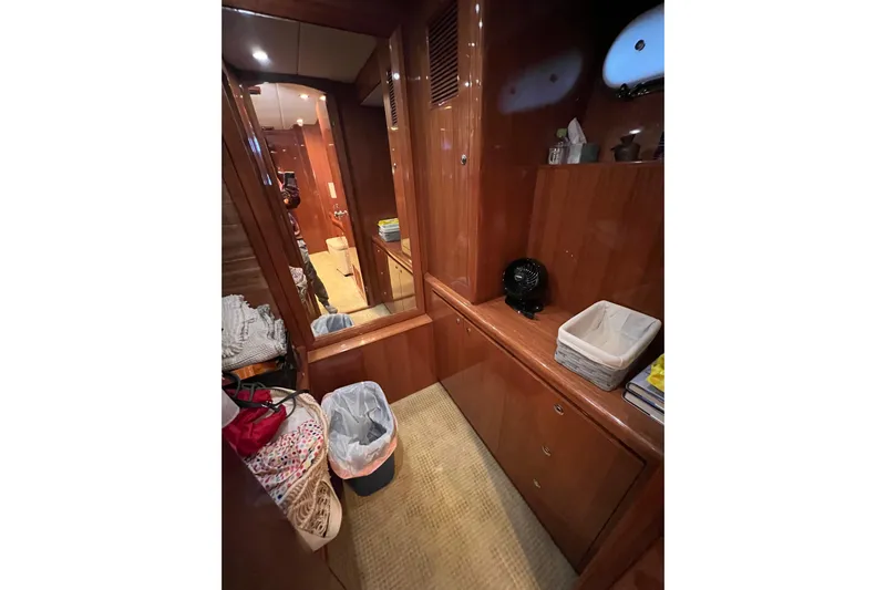 Bucephulas Yacht Photos Pics Luxurious 2012 Hampton motor yacht interior with wooden cabinetry and modern amenities.