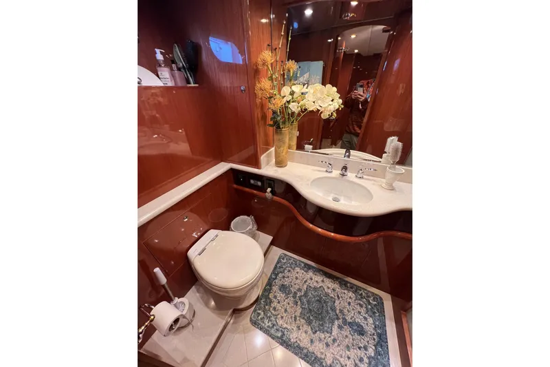 Bucephulas Yacht Photos Pics Luxurious bathroom in 2012 Hampton motor yacht with elegant decor and floral arrangement.