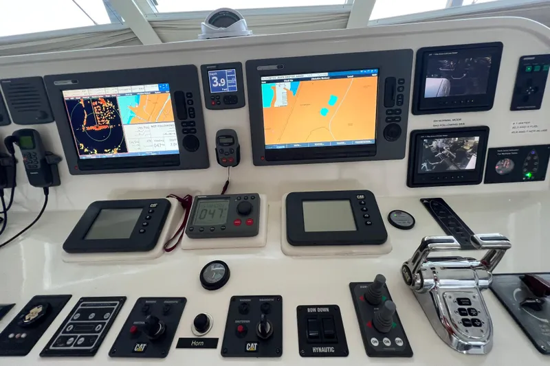 Bucephulas Yacht Photos Pics Control panel of a 2012 Hampton Motor Yacht with navigation and monitoring systems.