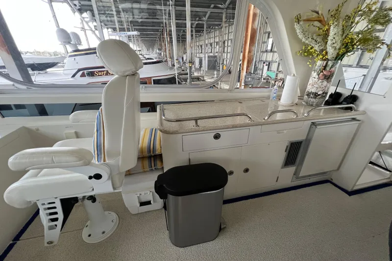 Bucephulas Yacht Photos Pics Interior of a 2012 Hampton Motor Yacht with a sleek helm and modern amenities.