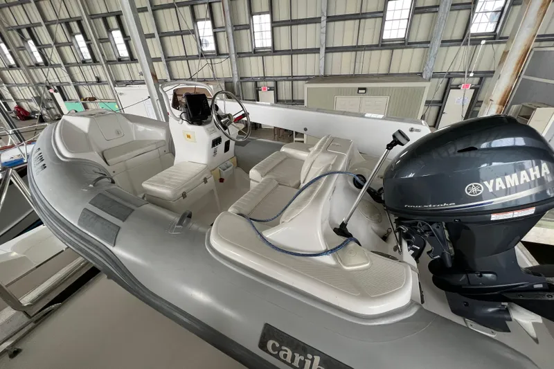 Bucephulas Yacht Photos Pics 2012 Hampton motor yacht with Yamaha engine in a boat storage facility.