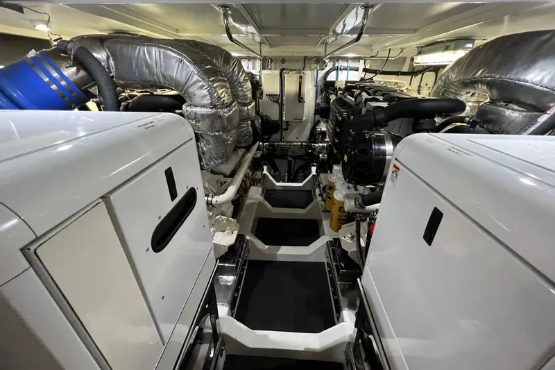 Bucephulas Yacht Photos Pics Engine room of a 2012 Hampton motor yacht, showcasing machinery and equipment.