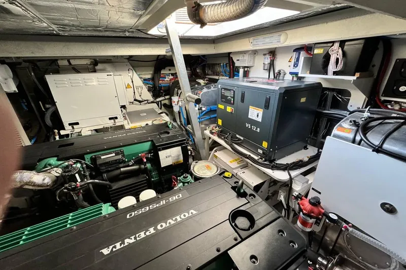  Yacht Photos Pics Engine room of a 2026 Prestige F4.9 yacht featuring Volvo Penta machinery.