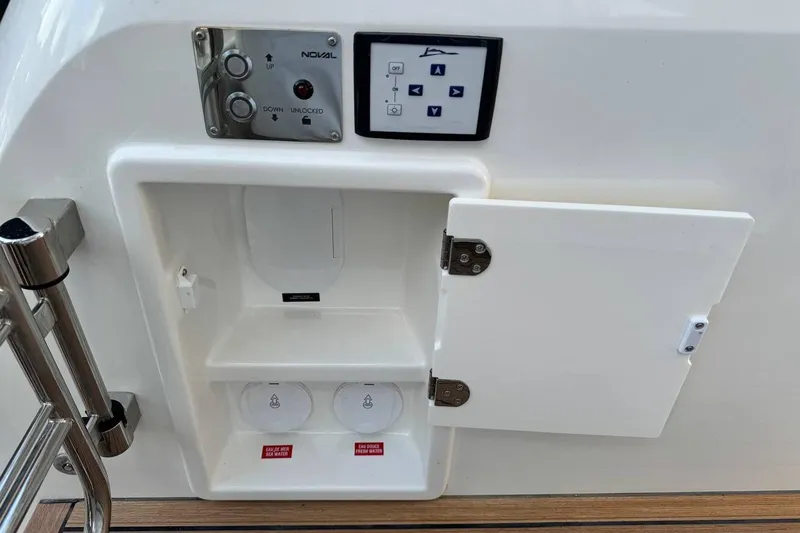  Yacht Photos Pics Control panel and storage compartment on Prestige F4.9, 2026 model yacht.