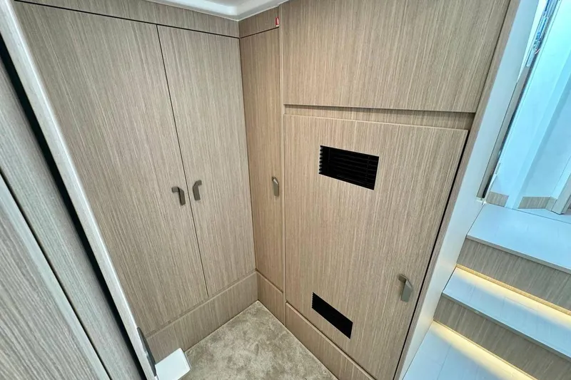  Yacht Photos Pics Modern interior of Prestige F4.9 yacht, featuring sleek wooden cabinetry, 2026 model.