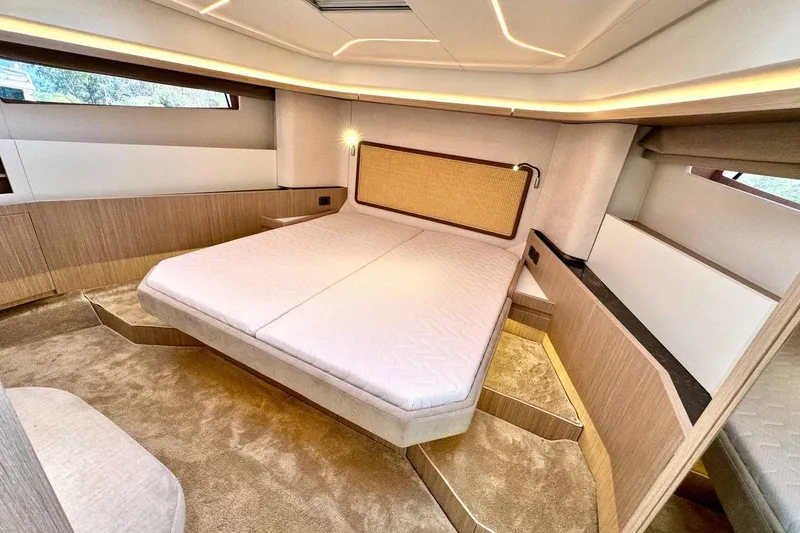  Yacht Photos Pics Luxurious cabin interior of 2026 Prestige F4.9 yacht with modern design and ambient lighting.