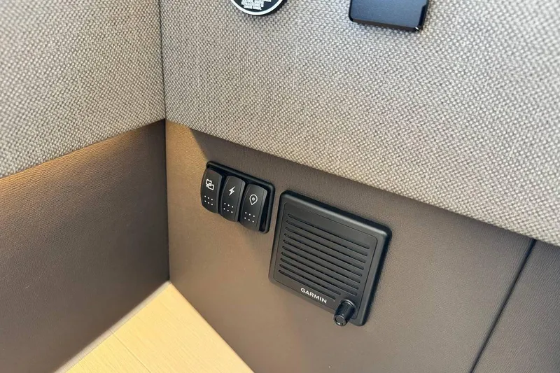  Yacht Photos Pics Control panel with switches and Garmin speaker in Prestige F4.9, 2026 model.
