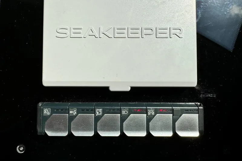  Yacht Photos Pics Control panel with Seakeeper branding on a 2026 Prestige F4.9 model.