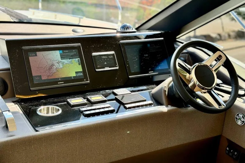  Yacht Photos Pics Prestige F4.9 yacht dashboard, 2026 model, featuring advanced navigation displays and controls.
