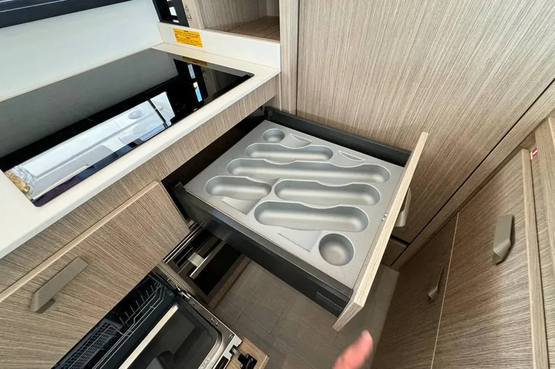  Yacht Photos Pics Modern kitchen drawer with cutlery organizer in 2026 Prestige F4.9 model.