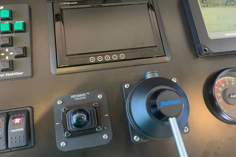 Cecelia Mae Yacht Photos Pics Control panel of 2015 Broward Raised Pilothouse M/Y with joystick and display.