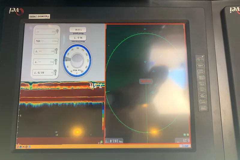 Cecelia Mae Yacht Photos Pics Navigation display on Broward Raised Pilothouse M/Y, 2015 model, showing radar and sonar data.