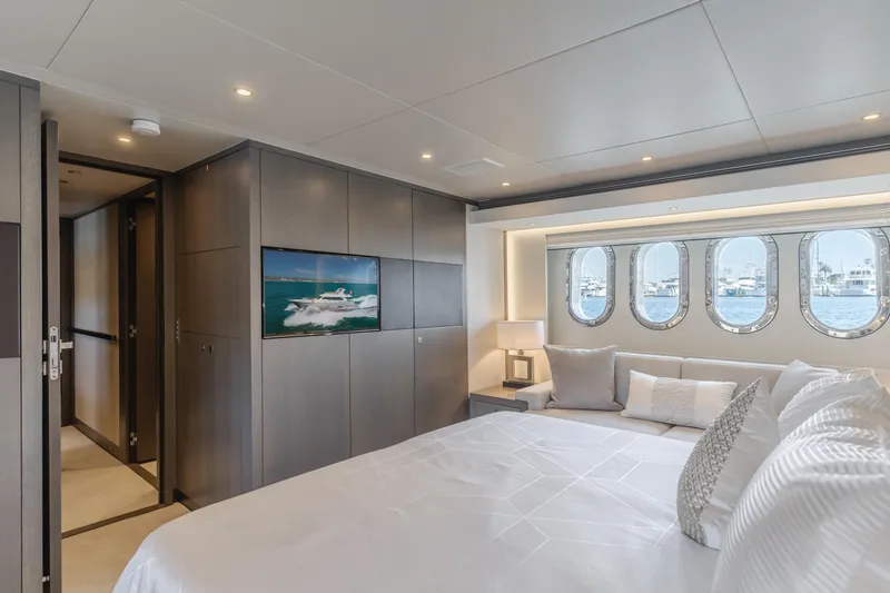 Gyrfalcon Yacht Photos Pics Luxurious bedroom interior of 2016 Van der Valk 78 Flybridge Motor Yacht with ocean view.