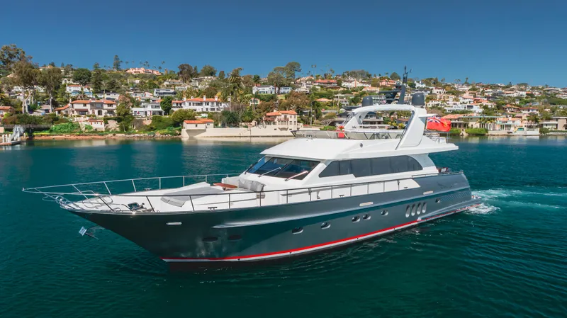 Gyrfalcon Yacht Photos Pics Van der Valk 78 Flybridge Motor Yacht 2016 cruising near coastal homes.