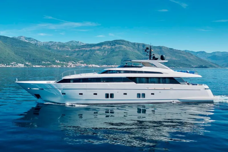 Sanlorenzo Sl118 Yacht Photos Pics Sanlorenzo SL118 yacht cruising on serene waters, 2021 model, with scenic mountain backdrop.