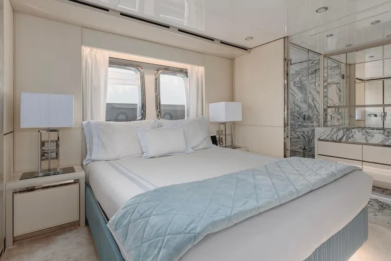 Sanlorenzo Sl118 Yacht Photos Pics Luxurious bedroom interior of 2021 Sanlorenzo SL118 yacht with elegant decor and marble accents.