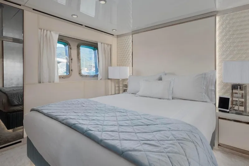 Sanlorenzo Sl118 Yacht Photos Pics Luxurious bedroom interior on 2021 Sanlorenzo SL118 yacht, featuring elegant bedding and modern decor.