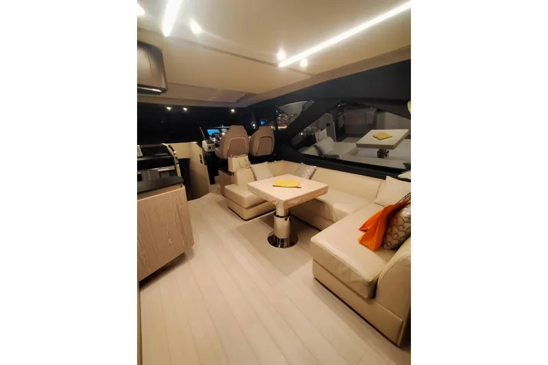  Yacht Photos Pics Luxurious interior of 2023 Azimut S6 Sportfly yacht with elegant seating and modern design.