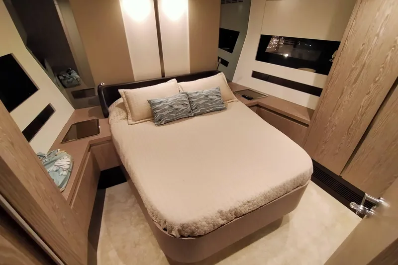  Yacht Photos Pics Luxurious bedroom interior of 2023 Azimut S6 Sportfly yacht with modern design.