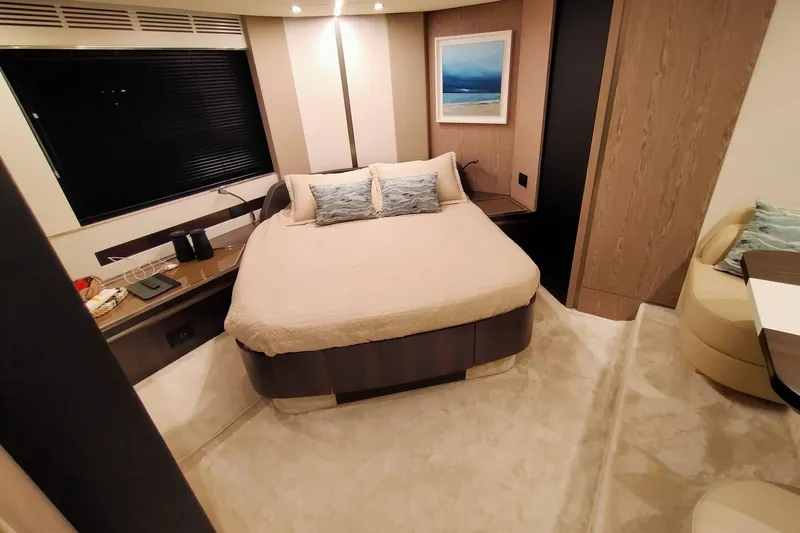  Yacht Photos Pics Luxurious bedroom interior of 2023 Azimut S6 Sportfly yacht with modern decor and cozy bedding.