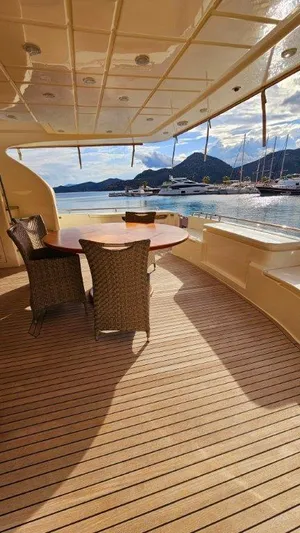  Yacht Photos Pics Luxurious 2012 Ferretti Yachts 881 deck with scenic marina view.