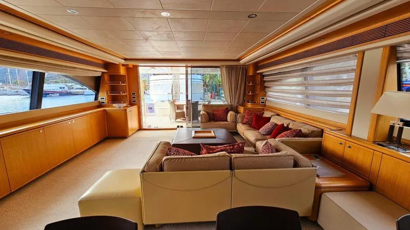  Yacht Photos Pics Luxurious interior of 2012 Ferretti Yachts 881 with elegant seating and panoramic windows.