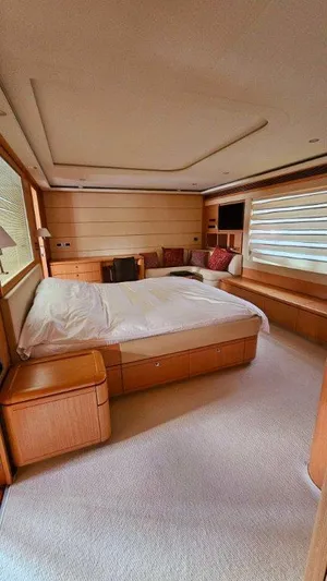  Yacht Photos Pics Luxurious bedroom interior of 2012 Ferretti Yachts 881 with modern furnishings and cozy ambiance.