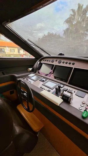  Yacht Photos Pics Cockpit of 2012 Ferretti Yachts 881 with advanced navigation controls and panoramic view.