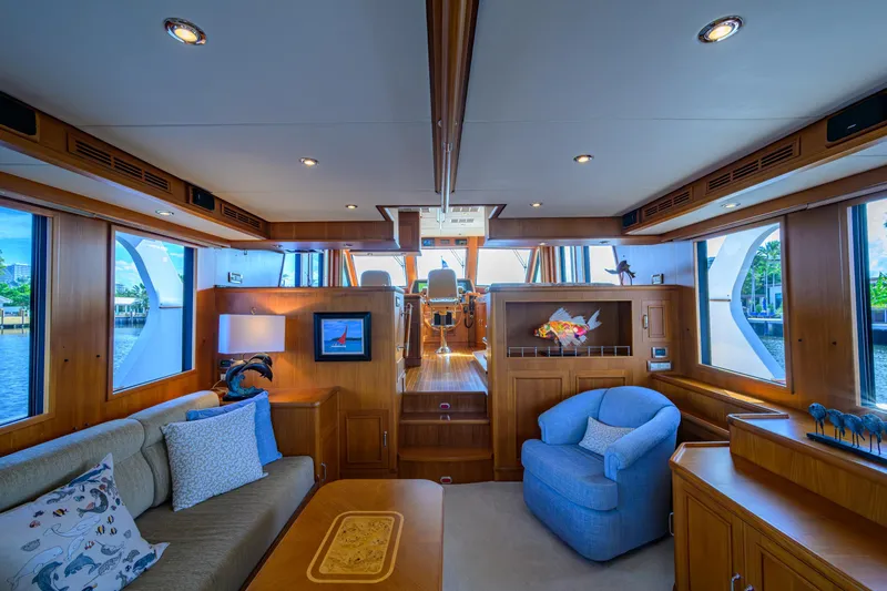 Monkey Business Yacht Photos Pics Luxurious interior of 2007 Grand Banks 59 Aleutian RP yacht with elegant wood finishes.