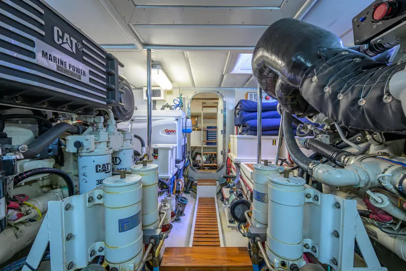 Monkey Business Yacht Photos Pics Engine room of 2007 Grand Banks 59 Aleutian RP yacht, featuring CAT marine power systems.