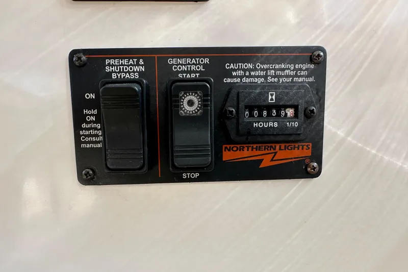 Handful Yacht Photos Pics Control panel of a 2014 MJM 40z boat with generator hour meter.