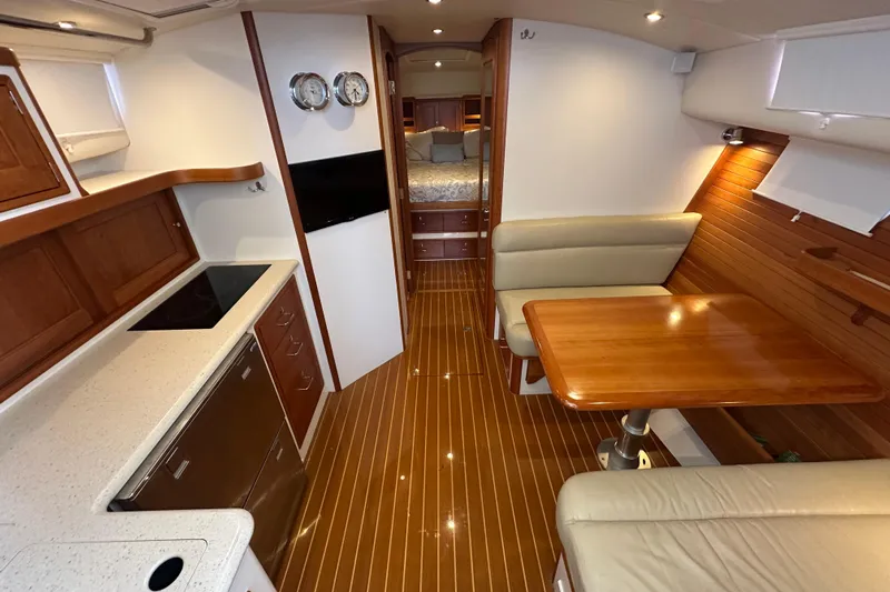 Handful Yacht Photos Pics Luxurious 2014 MJM 40z yacht interior with elegant wood finishes and modern amenities.