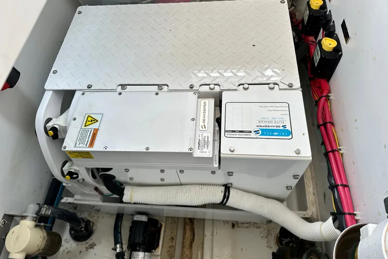 Handful Yacht Photos Pics Engine compartment of a 2014 MJM 40z boat featuring Seakeeper stabilizer system.