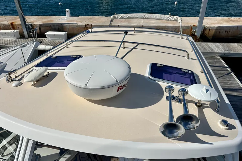 Handful Yacht Photos Pics Rooftop view of 2014 MJM 40z boat with radar and horns at dock.