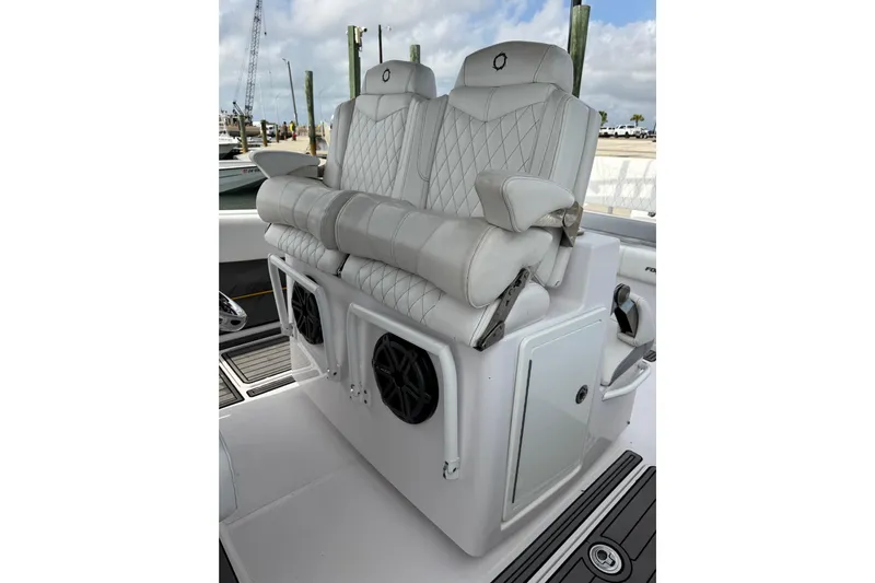  Yacht Photos Pics Luxurious seating on 2018 Fountain 34 Center Console boat with diamond-stitched upholstery.