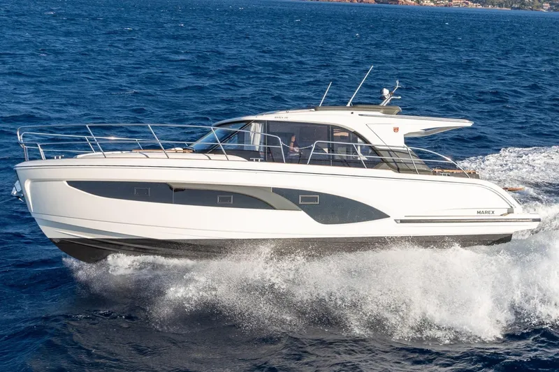  Yacht Photos Pics 2026 Marex 390 yacht cruising on open sea, showcasing sleek design and modern features.